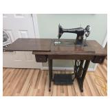 Vintage wood and metal singer sewing machine