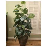 Plastic planter with faux plants