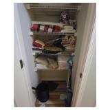 Closet lot of blankets pillows and more