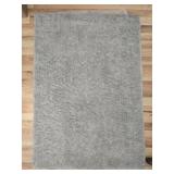 Grey color small rug