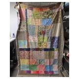 90" by 55" multi colored quilt