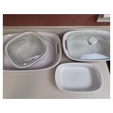 4 CorningWare baking dishes 2 w lids
