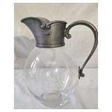 Glass pitcher with aluminum top
