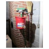 Brooms and Mop on Rack