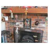 Windchimes and Other Items Hanging From mantel