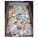 Box of canceled mostly US Stamps