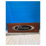 Pierce Logo - Mounted on a Mahogany Background