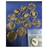 (12) Assorted Clad Kennedy Half Dollars