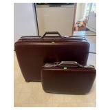 American Tourister roll-on suitcase; Attache case