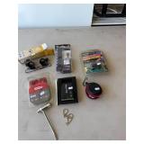 Magnifiers; Chain Saw Chain; Gun Lock; USB port