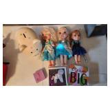 2 singing flashing light Elsas from  Frozen and