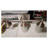 bathroom light fixture missing one globe, b