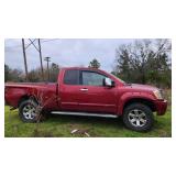 2004 Red Nissan Titan 4 wheel drive 4 door king