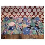2 quilt squares large with 1939 paper on the