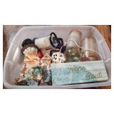 tote full of religious items and decor items