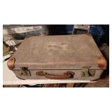 1942 canvas and leather carry-on suitcase does
