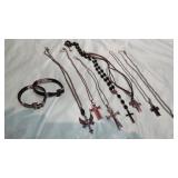 large lot of religious necklaces and bracelets