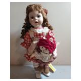 Cute porcelain doll on stand 17"