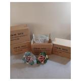 Rose curtain holdbacks, three sets new in box,