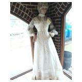 Mannequin wearing lovely lace wedding gown 69"