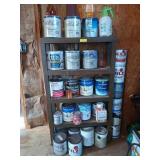 4 tier plastic shelving with lots of paints,
