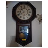 Regulator A pendulum wall clock with key
