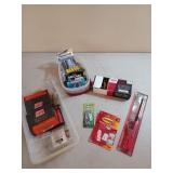 Batteries and fasteners and heavy duty Staples