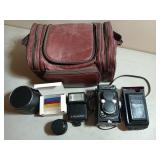 Yashica MAT-124 camera in bag w/ lens, flash etc