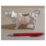 Cow creamer
