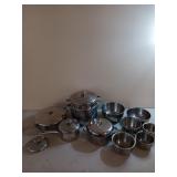 Set of pots and pans and mixing bowls