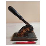 Turn of century ornate heavy cast stamp?