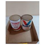 Two cans of motor oil, one in metal tin one in