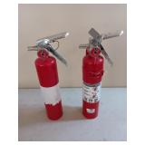 Two small kitchen fire extinguishers