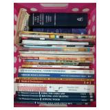 Plastic crate of assorted woodworking books, the