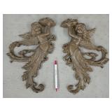 Pair of cast iron cherub wall hangings 14x9