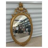 Oval wall mirror 31x16