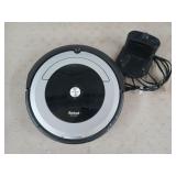 Roomba robot vacuum w/ charger, works