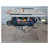 Ryobi 10-in portable table saw on wheels, works,