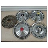 5 automobile hubcaps