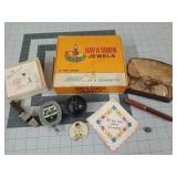 Cigar box w/ old whistle, belt key retriever,