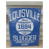Metal Louisville slugger sign 16x12.5