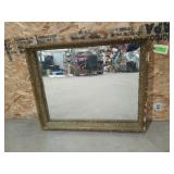 Lovely ornate framed mirror 25x31 has some damage
