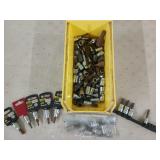 Plastic tub of assorted foreign sockets