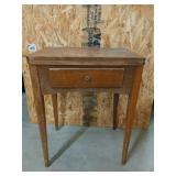 Singer sewing machine in wood table