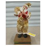 Saxophone rock and Santa with rat chewed boot 15"