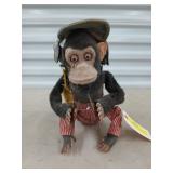 Antique battery operated symbol playing monkey