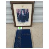 Framed portrait of Ronald reagan, dollar coin