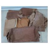 Leather scraps in plastic tub