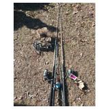 3 fishing poles with reels and casting net