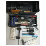 Stanley plastic toolbox of assorted gun parts,